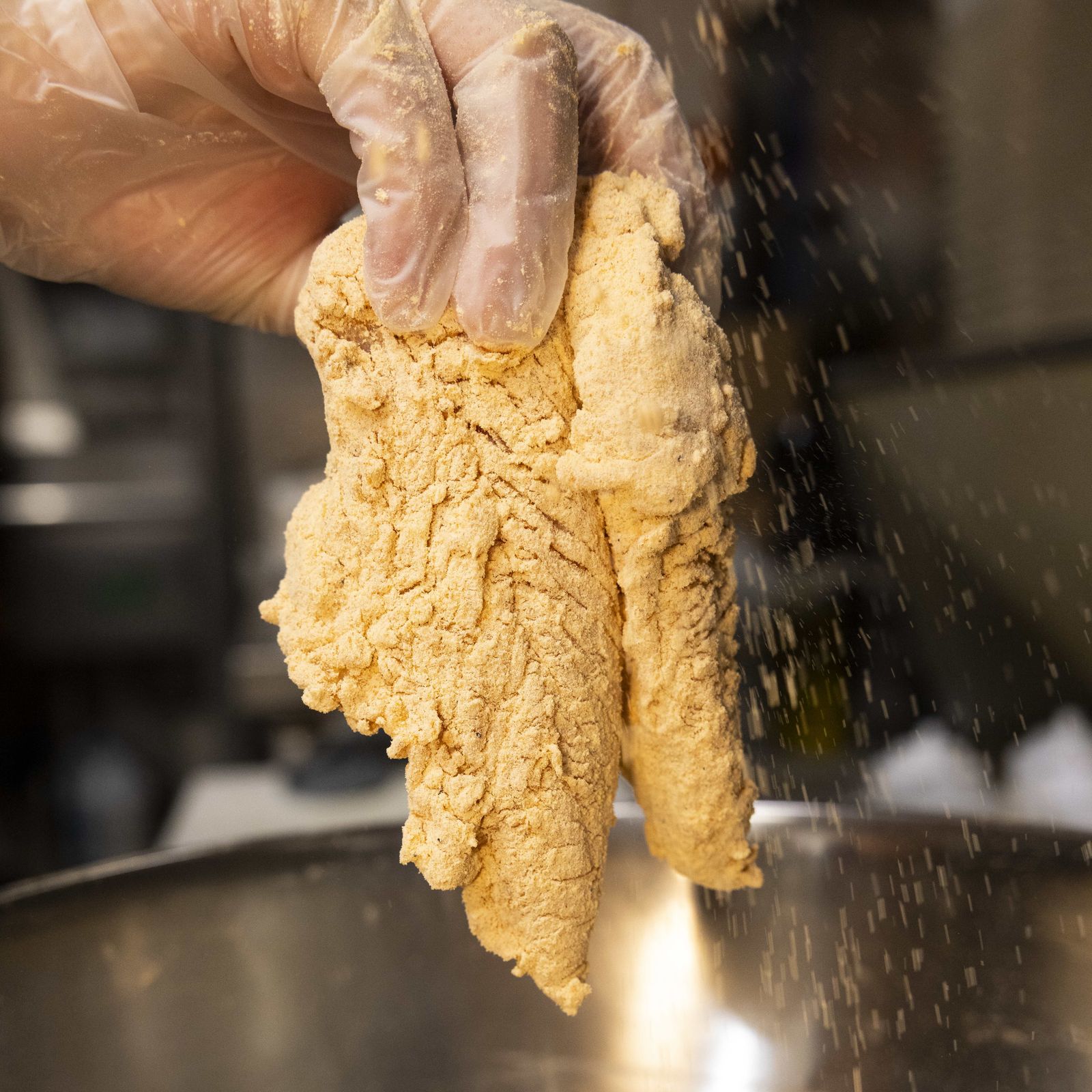 Thin-sliced steak being prepared for a cheesesteak